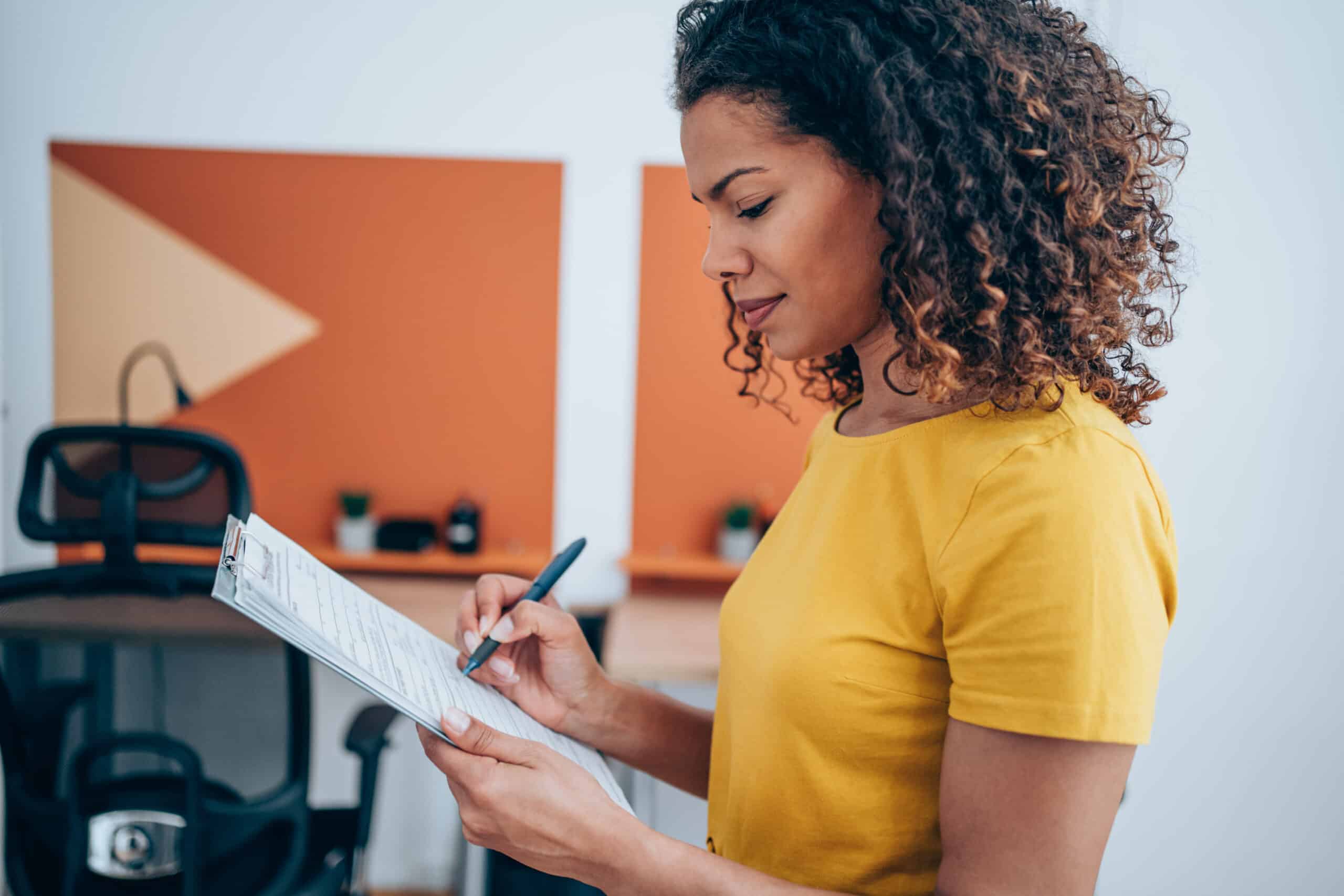 Woman makes notes 