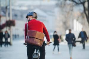Commuter on bicycle riding